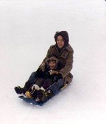 Andy McDougal; Ruth Bennett McDougal Dorrough; Family; sled snow